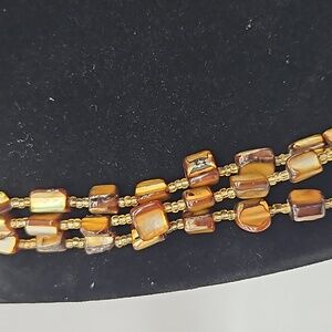 3 strand graduated size dyed shell necklace